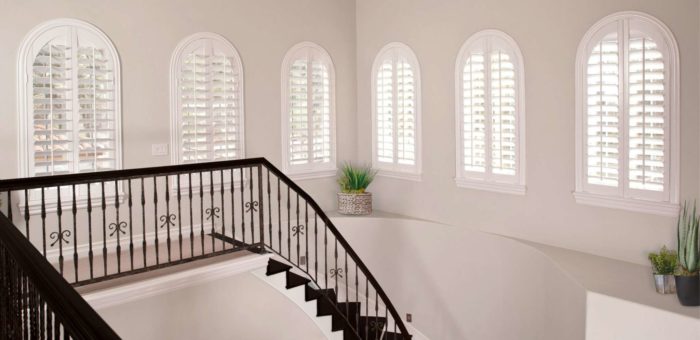 Polywood shutters keep your house warm due to their tight fit Plantation shutters over a stairwell